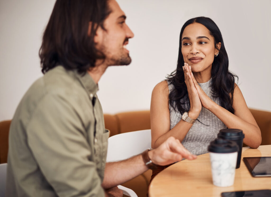 A couple engaging in conversation.