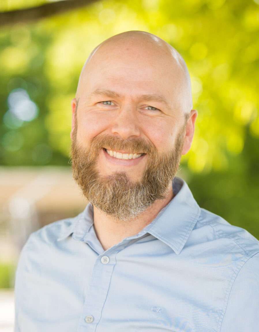 Man with beard in outdoor setting
